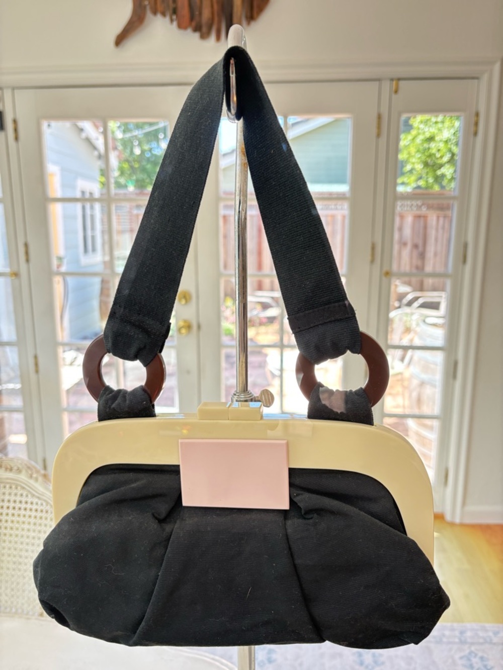 Black Shoulder Bag with Cream Frame and Pink Accent